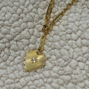 Gold Pendant Necklace with Starburst Design